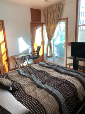 StaySimpler Loft District Spacious Master Bdrm with Private Bath and Sun Deck